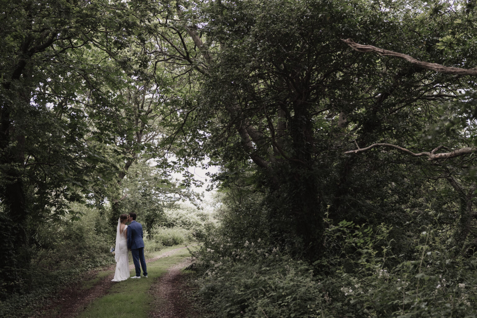 Romantic moment caught by the stams journalistic wedding photographers in hampshire